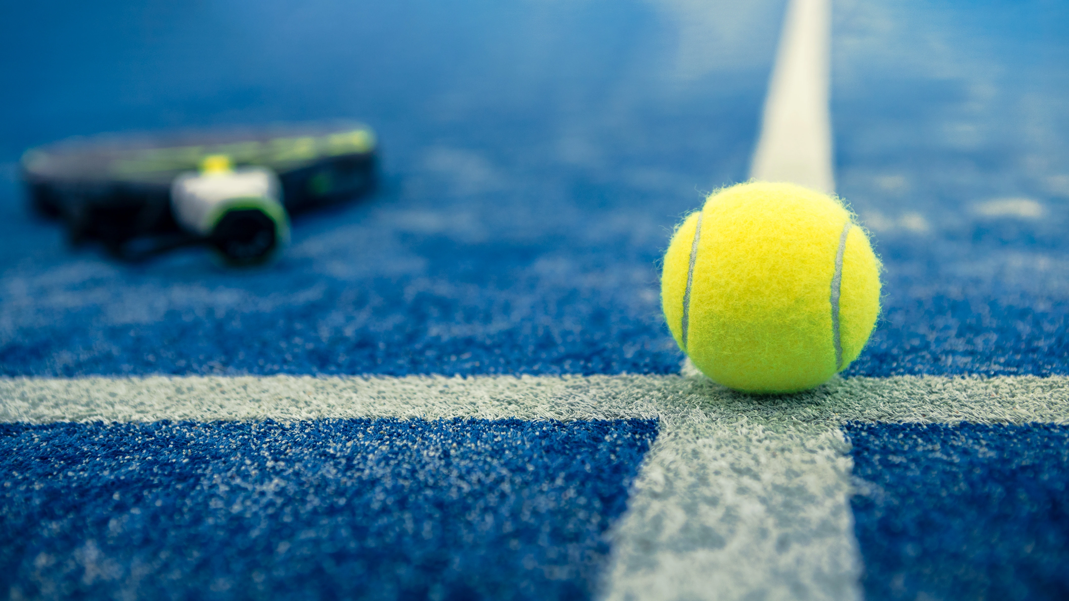 padel racket and ball
